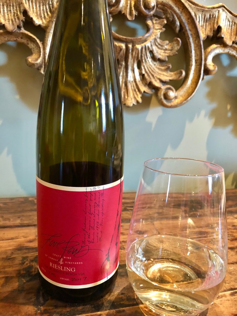 Bottle of Five Rows Riesling Wine with glass