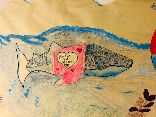 Children's drawing of a whale that says save the sea ice
