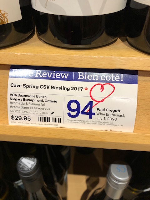 Shelf display showing Cave Spring CSV wine getting a 94 point rating