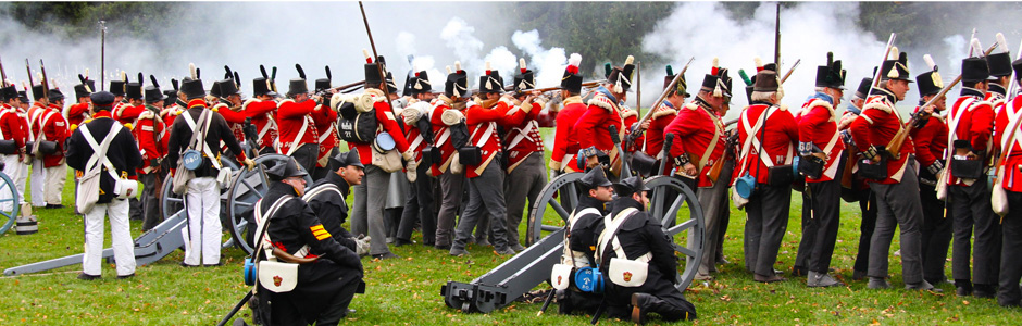 british redcoats lined up for battle with cannons during war of 1812