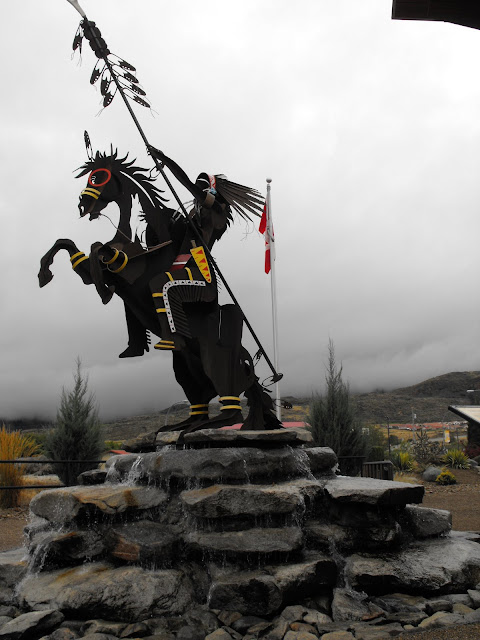 metal sculpture with Indigenous Chief on horse 